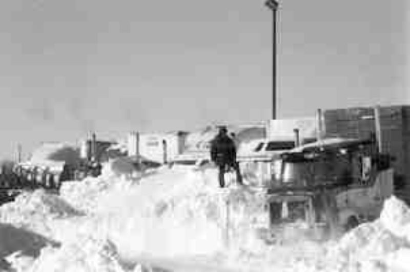 KEEP ON PARKIN': Deep snow, like freezing rain and high winds, can create impossible working conditions, making a joke of just-in-time delivery.