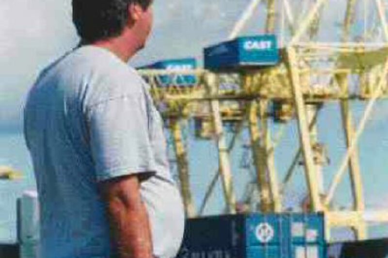 AFTERMATH: A disheartened union member quietly contemplates all that the strike did not accomplish. (Photo by Carroll McCormick)