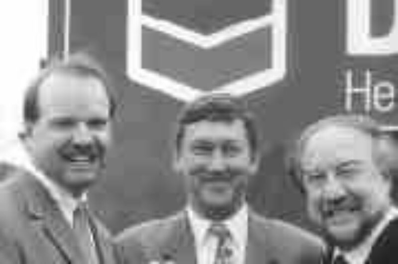 SLICK JOB: Chevron sales manager, Tony Arado, left, presents Tribospec's Richard Allard and Julian Cininni with the silver award.