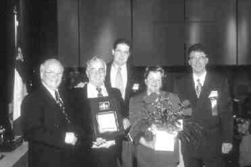 SMOOTH OPERATOR: Transport Minister Guy Chevrette, 2001 Volvo Quebec Driver of the Year Herve Morin and Volvo Trucks Canada president Michael O'Connell are joined by Herve's wife Francine and Serge Leclerc, QTA president.