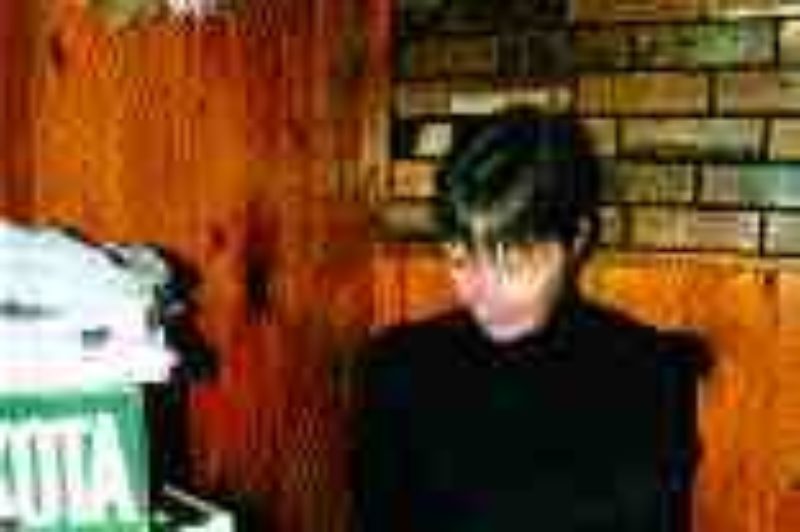 BOXED IN: Fotheringham works through one client's receipts.