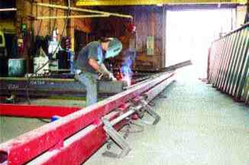 FLASHY OPERATION: Doepker employees put together about 1,400 trailers each year at the Annaheim assembly plant. Photo by James Menzies