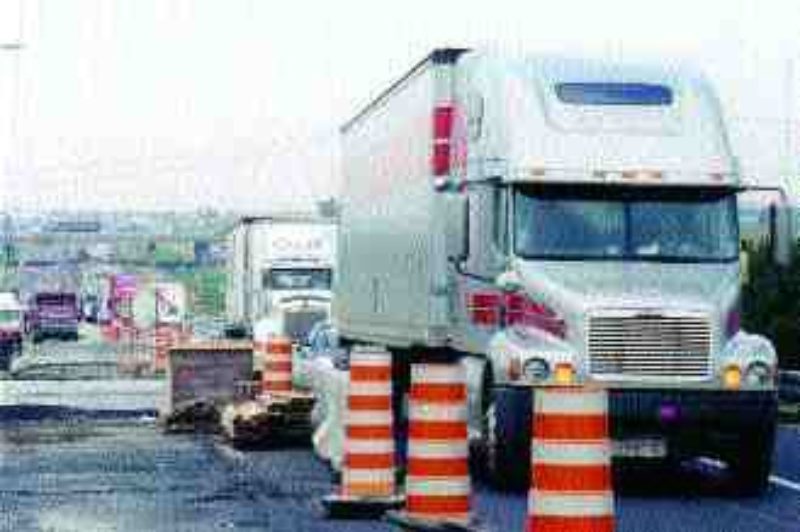 SQUEEZED: Construction means delays, but long-term, traffic will move better.