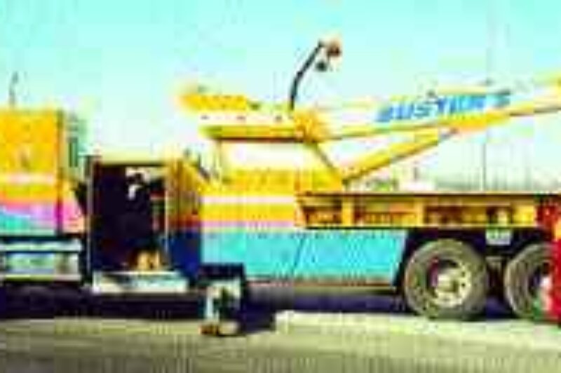 NEW MATH: One big truck equals a lot of big jobs for Buster's Towing.