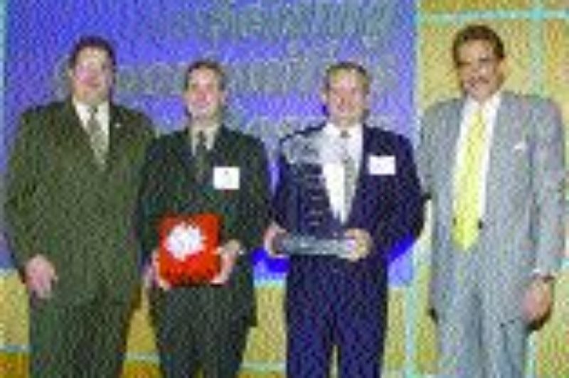 TOP SHOP: Nick Panza, Peterbilt general manager and Paccar vice-president; Terry Pasiuk, owner and general manager of Peterbilt Trucks Pacific (Surrey, B.C.); Don Pasiuk, owner and dealer principal of Peterbilt Trucks Pacific; and Dan Sobic, Peterbilt assistant general manager.