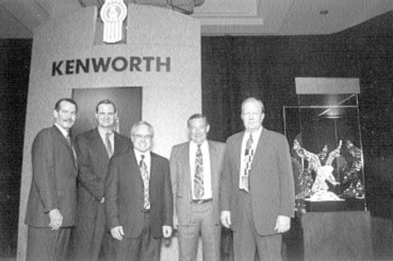 RECOGNITION: Inland Kenworth Ltd. in B.C. was named 2002 Kenworth Dealer of the Year. From left are: Chris Braun, Bob Christensen, Dick McConnachie, Leigh Parker and Jim Beiderwieden.