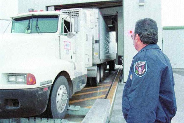 HIGH ALERT: As the U.S. prepares for a possible war in Iraq, security is tight for cross-border carriers. Truck News explores several key issues facing truckers who haul into the U.S.