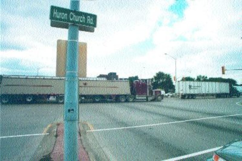 TIE-UPS: Border delays at the Ambassador Bridge disrupt traffic on Huron Chruch Rd., the major truck route in Windsor, and create havic for residents.