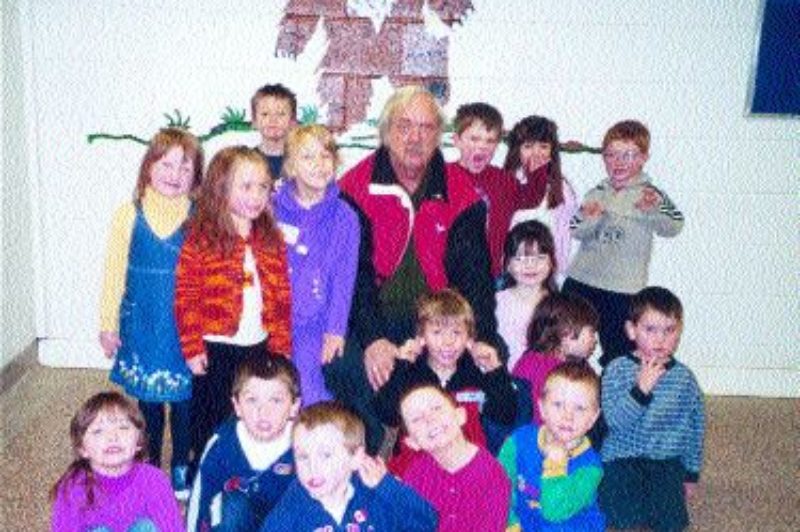 HIGHER LEARNING: Driver, Rock Allen, helps the French immersion students at Boundary Street Public School in Prescott, Ont.
