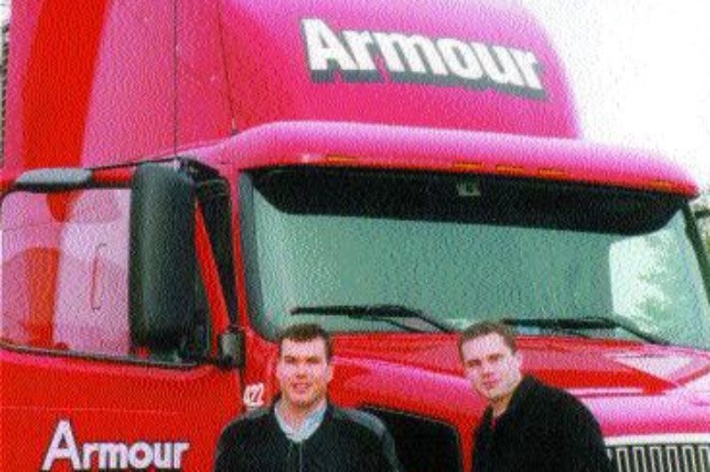 FAMILY MATTERS: Angus Armour (left) and his brother Ralston (right) are a big factor in Armour Transportation Systems running so smoothly.
