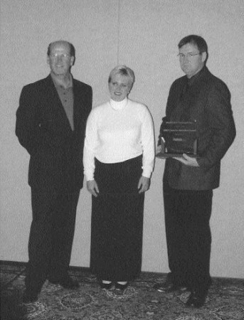 CONGRATS: (From left to right) Ray Haight, Caroline Blais and Bill Kalbhenn of Mackinnon Transport.