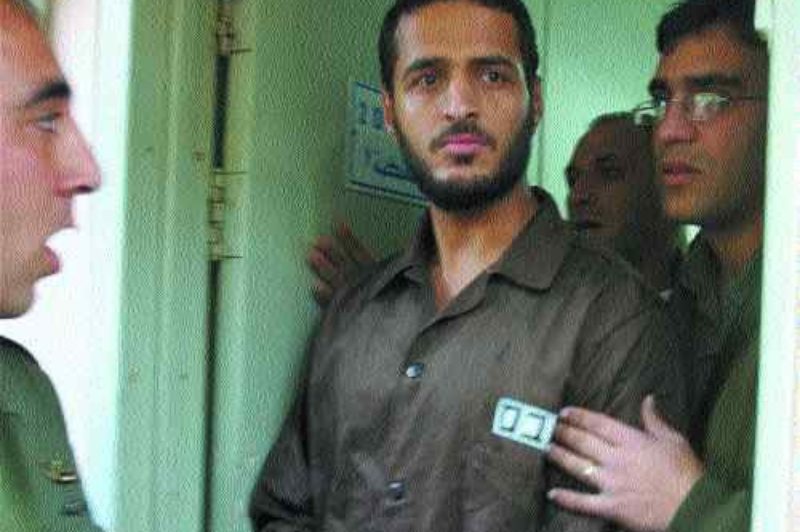 TERROR THREAT?: Jamal Akkal is escorted into Israeli military court. Photo with permission of Canadian Press