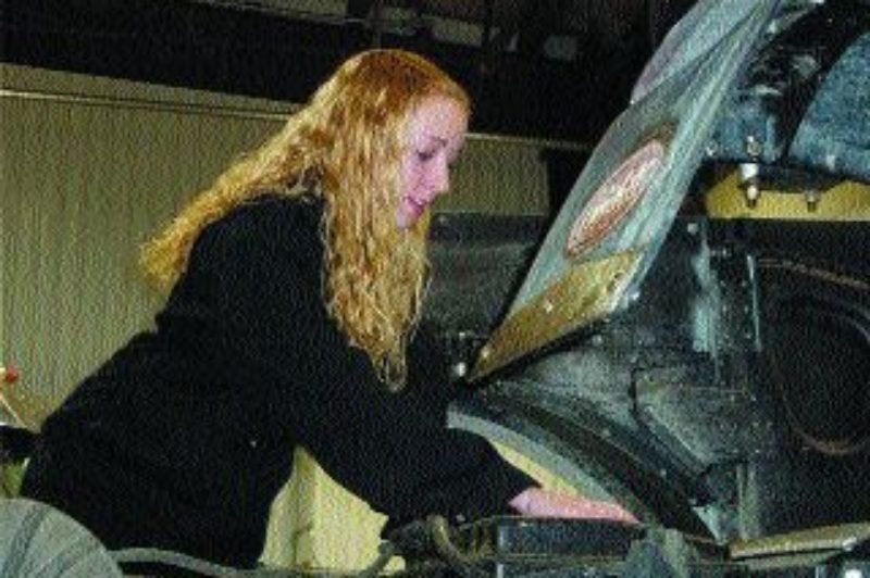 THE REAL DEAL: Amanda Stagg, 16, spends several hours a day in a garage, doing oil changes and making small repairs, as part of a Grade 12 co-op experience. Her eventual goal is long-distance trucking. Photo by Harry Rudolfs
