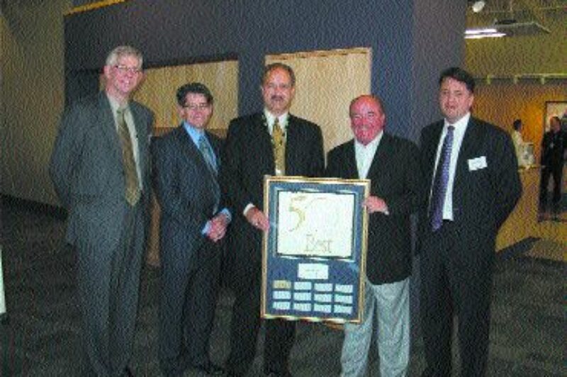 CONGRATS: Bison Transport recently celebrated its 35th anniversary with an awards presentation where company representatives were presented with the 2003 50 Best Managed Companies Award.Shown (left to right) are: Victor Bergmann, Brian DeGagne, Don Streuber, Duncan M. Jessiman and Anthony Kulbacki. n