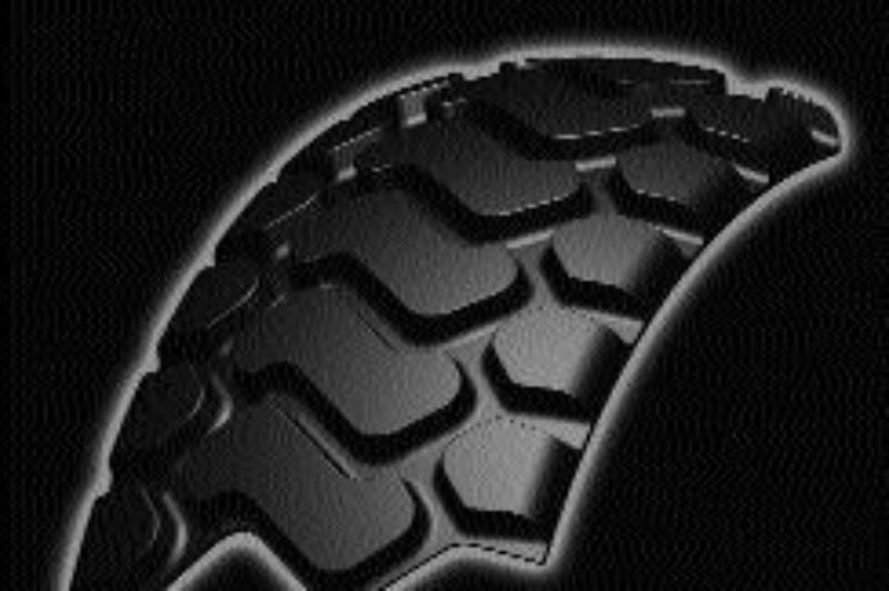 SERPENTINE TREAD: This design simplifies the retread application for a diverse number of OTR equipment according to Bandag.