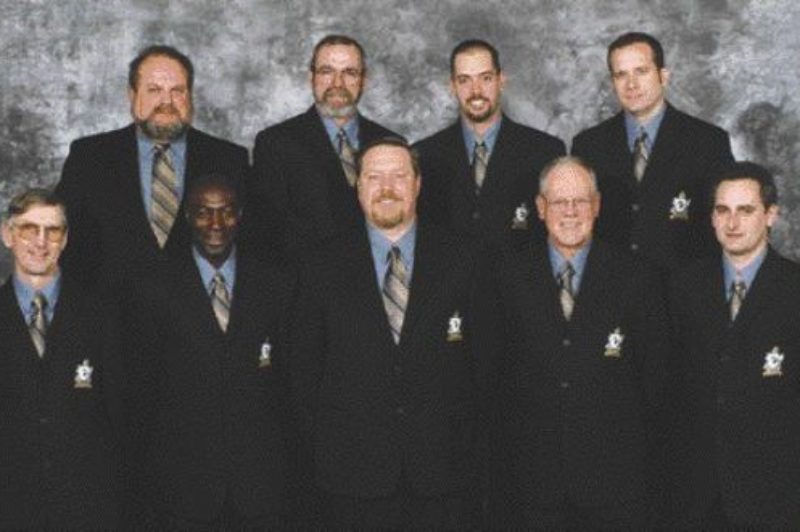 KNIGHTS OF THE ROAD: Back row, left to right: Alvin Kane, Kriska Holdings; Angus MacCormac, Bison Transport; Matt Graveline, McArthur Express; John McDowell, Trimac Transportation. Front row, left to right: Ted Wheeler, TST Overland Express; Trevor Weir, Thomson Terminals; Martin Dej, Kriska Holdings; Bob Morley, TKO Transportation; and Rod Bedard, TST Overland Express.