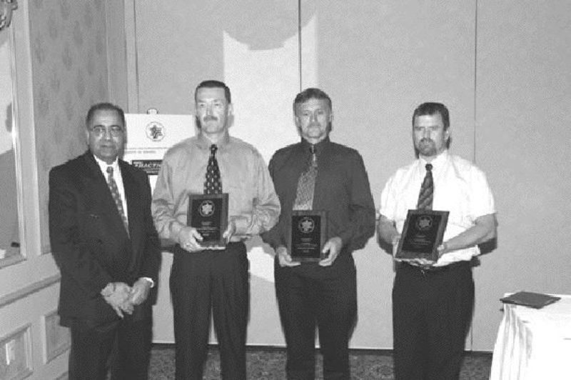 VALOUR CHAMPS: Ontario Transport Minister Harinder Takhar with Award of Valour winners Larry Lewis, Larry Wheatley and Dave Brodrecht.