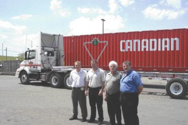 THE CREW: (Pictured left to right) Jim Zborowsky, Di-Mond Trailers Inc.; Rob Turner, fleet maintenance manager, Canadian Tire; Joe Monaco, general manager, Di-Mond Trailers Inc.; and Pat DiLillo, owner, Di-Mond Trailers Inc.Photo by Adam Ledlow