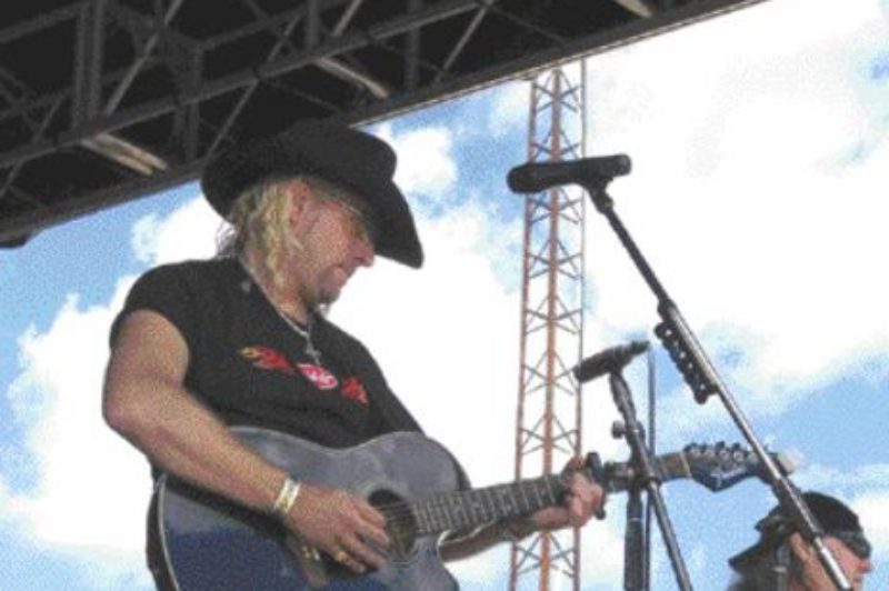 TRUCKER ROCK: GM Paterson gave the crowd at the Fergus Truck Show a taste of his country rock with a trucker edge.Photo by Adam Ledlow
