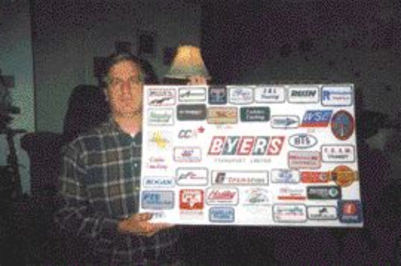 PATCHED UP: Collector David Ross proudly displays just a fraction of his truck company patch collection.