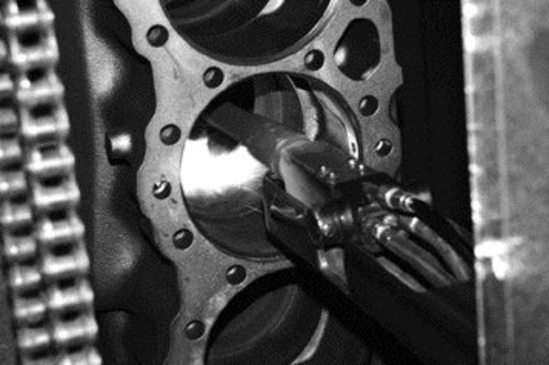 HOT STUFF: An engine block is flamesprayed during the extensive two-week process that remanufactures old engines into new ones.