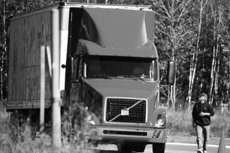 HIGH HOPES: Team Atlantic member Ron Wood of Midland Transport does a quick walk-around before starting competition. Wood wound up taking the runner-up spot in the five axle class.