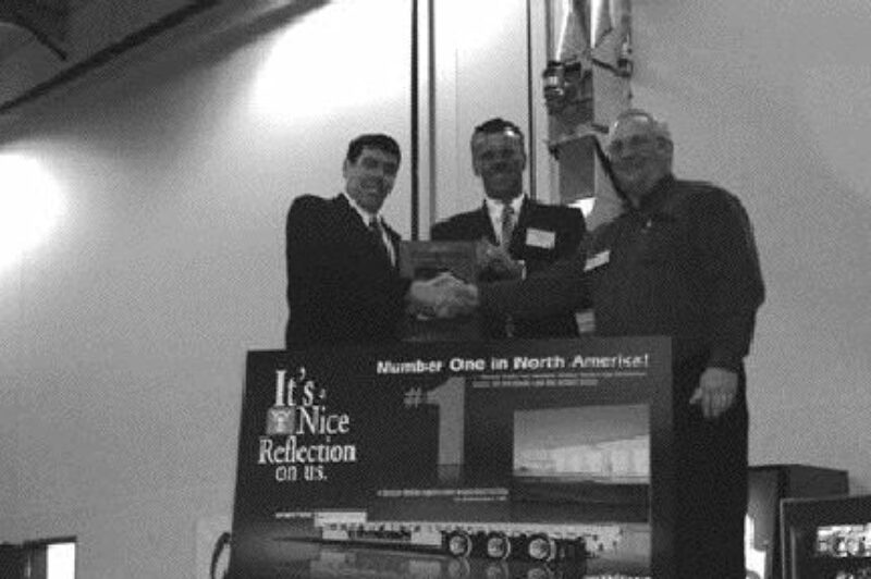 CONGRATS: Harvey Van De Sype (right) of Wilson Trailer congratulates Mike Keay (left) and Sid Keay during Ocean Trailer's recent open house at its new 41,000 sq. ft. facility.   Photo by Steven Macleod