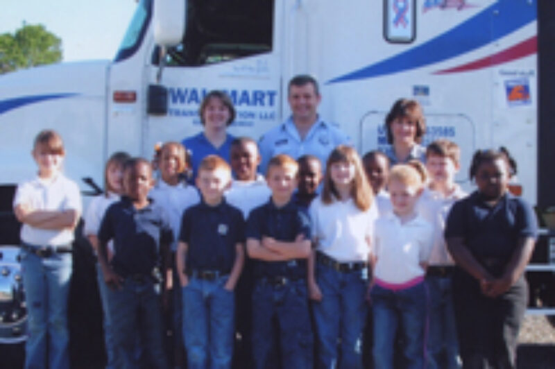 Trucker Buddy Chris Jones, his wife Brenda (back row, left) and teacher Janet Blackwell (back row, right) with the second grade class at Simsboro High School in Simsboro, La., during the 2005-06 school year.