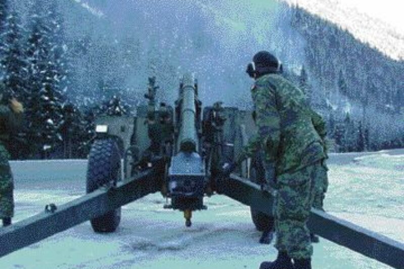 FIRE!: Soldiers from 1 RCHA fire artillery into a mountain to spark a controlled-avalanche in hopes of avoiding lengthy road closures.