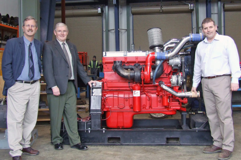 From left, Fred MacDonald, dean of Trades and Applied Technology, Ross Somerville, marketing manager for Cummins Western Canada, and Paul Mottershead, coordinator/instructor, Heavy-Duty Commercial Transport Mechanics program with the latest addition to the program: a Cummins ISX diesel engine.