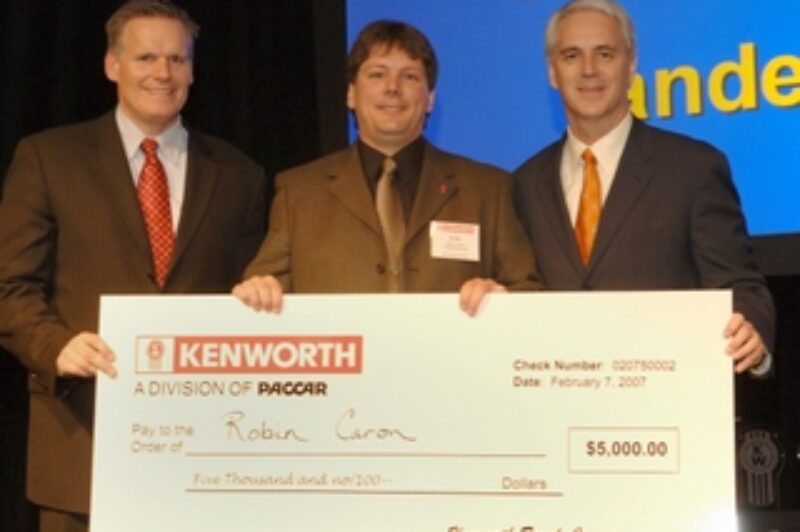 Robin Caron, centre, beat out competitors from across North America to win Kenworth's Medium Duty Walk-Around competition.