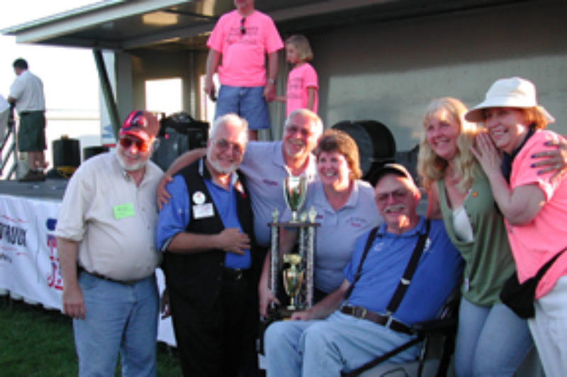 Gary King, fifth from left, surrounded by friends at the Iowa 80 Truckstop, at the first annual Gary King Trucker Buddy award presentation during the Walcott Truckers Jamboree, July 2006.