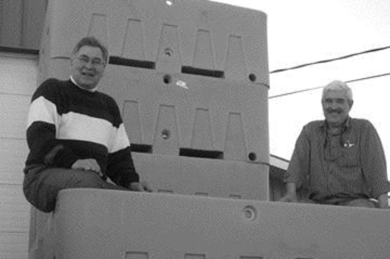 LEGO FOR LOBSTERS: BioNovation's live seafood transport systems are stackable, portable and designed to provide the next best thing to a real ocean environment. Pictured are Peter Dockrill (left), business development manager and Joe Boudreau, president and general manager of BioNovations. Photo by Adam Ledlow