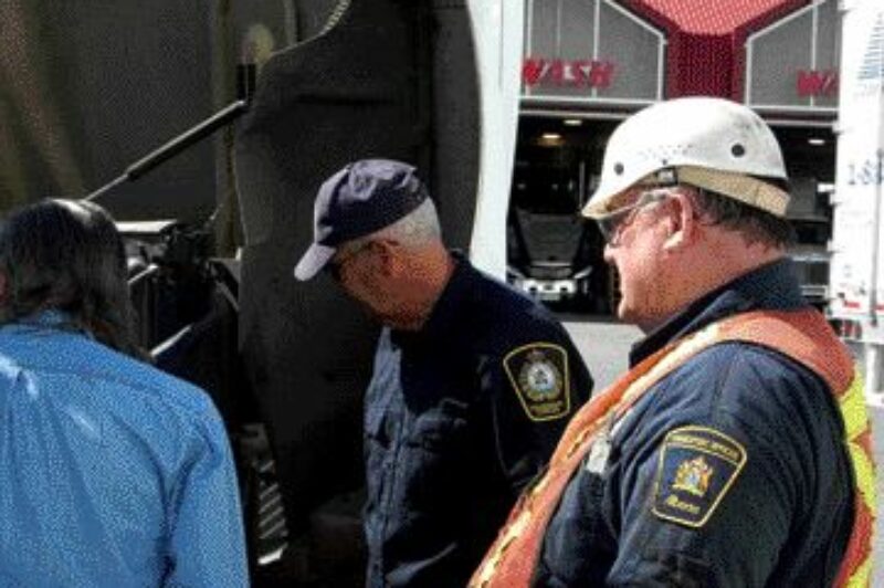 TROUBLE?: Without a safety program, drivers may find themselves in this situation, having to do some explaining to enforcement officers.