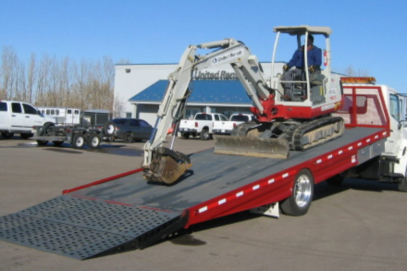 The Jones Body Company tilt and load body allows for the quick and easy loading of heavy equipment.