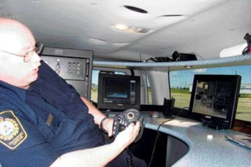 HEAT SEEKER: Inspection officer Ken Pollard demonstrates how the thermal imaging system can detect heat, which may be indicative of safety issues.