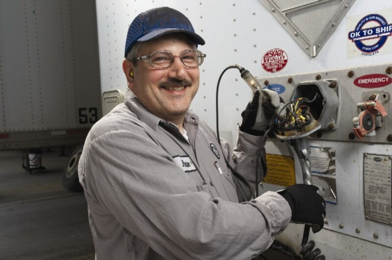 GE Mechanic Peter Metzoian performs a diagnostic check on a trailer, part of routine maintenance performed on both company and customer-owned assets by Trailer Fleet Services.