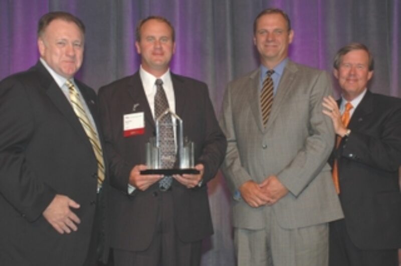 From left are Dennis Beal, vice-president physical assets, FedEx Freight; Mark Mendel, branch manager for selling dealer MHC Kenworth  Springfield in Springfield, Mo.; Bob Christensen, Kenworth general manager and PACCAR vice-president; and Doug Duncan, president and CEO, FedEx Freight Corporation.
