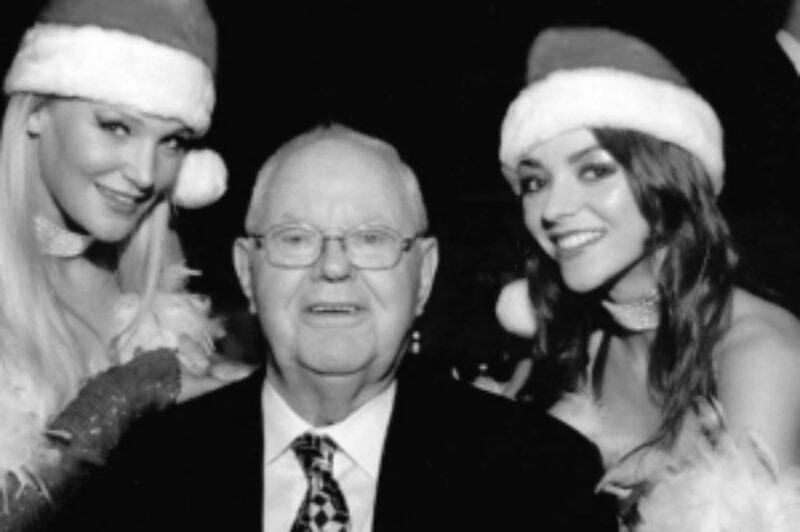 CELEBRATING 70 WITH SANTA: Wilson Group founder Carl H. Wilson discusses delivery strategies with two of Santa's helpers at the company's 70th birthday party at the Palais Royale Ballroom in Toronto. The recent celebration, which had a 1930s theme, featured awards presentations, speeches, big band music and a Las Vegas floor show, along with delicious edibles and plenty of bubbly. Word has it that in true '30s style, guests had to knock twice and tell the doorman 