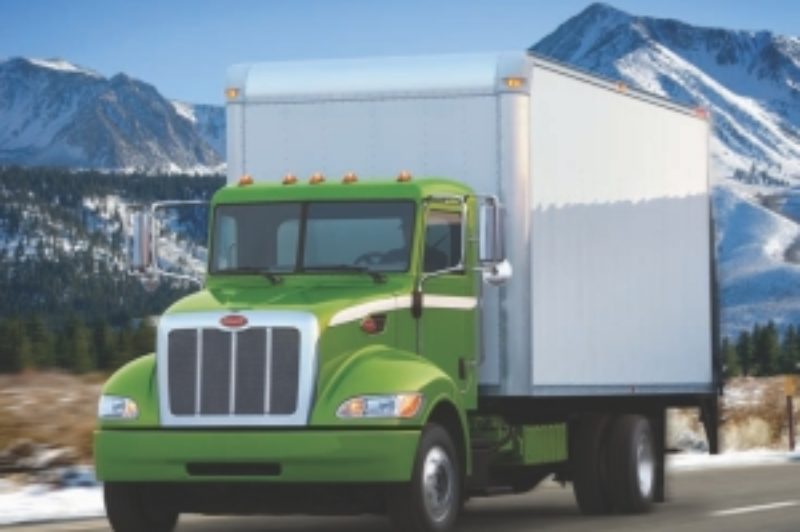 GREENER PASTURES: Peterbilt's Model 330 hybrid will go into full production this summer, the company announced at the Mid-America Trucking Show.