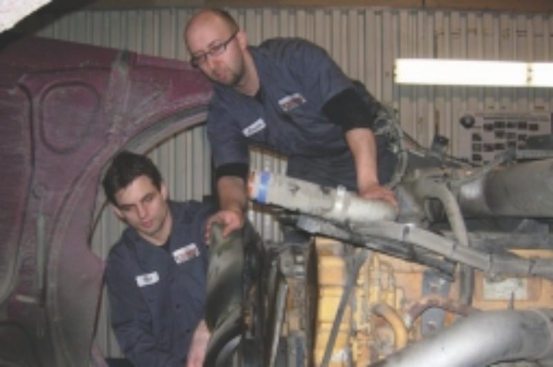 CUSTOMER FOCUS: Business partners Justin Lee and Neil Klawitter say that operating a small shop has its advantages.