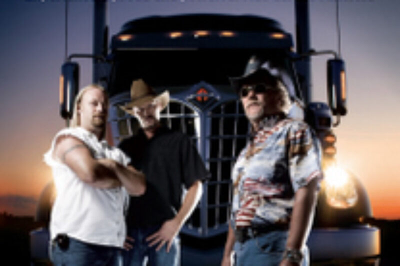 The stars of 'Drive and Deliver' (Chris, Tim and Steve) pose in front of an International LoneStar in this film poster.