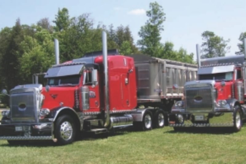 MOST WORK IN SHOW?: Polishing a dump truck for a show'n'shine competition is a daunting task, as Glen Watts, owner of these trucks, can attest.