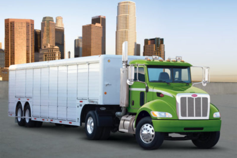 Peterbilt's new Model 335 hybrid electric tractor boasts up to 25% fuel savings according to the manufacturer.