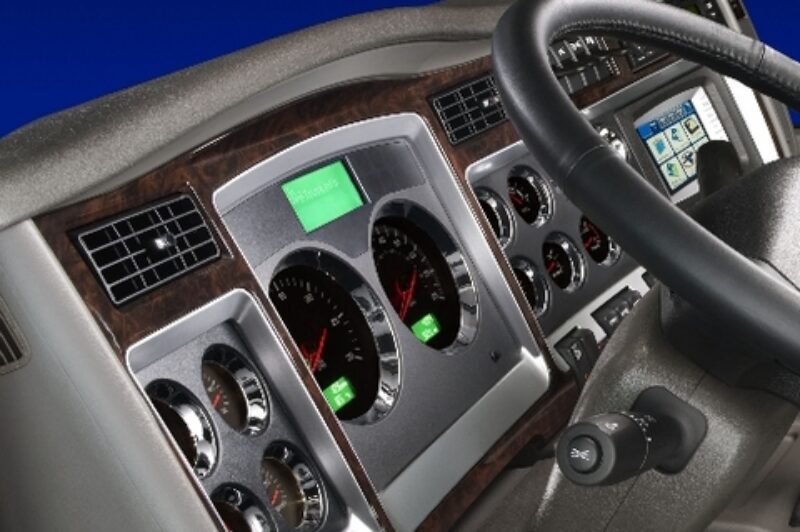 Kenworth is adding wood finish accents to the interior of many of its Class 8 and medium-duty models.