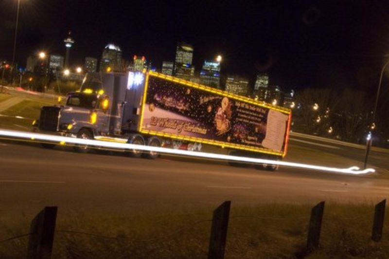 The 18 Wheels of Christmas trailer takes a break for a photo between deliveries.