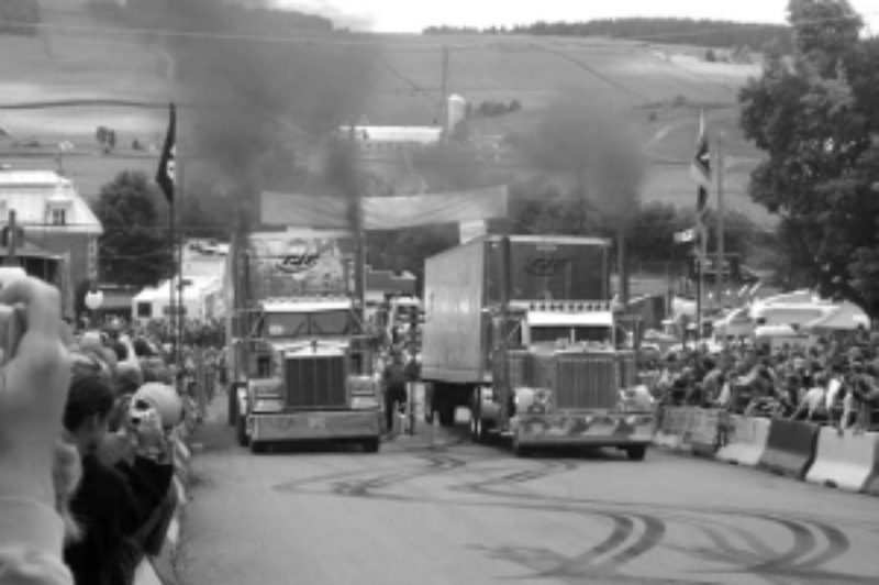 AND THEY'RE OFF: Trucks go head-to-head during an up-hill drag race at the annual event in Southern Quebec.