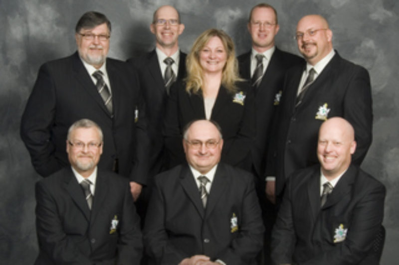 Back (l - r): Brian Panchuk; Roger Douthwaite; Anne Finley; Todd Badour; and  Guy Broderick. Front (l - r): Bob Duncan; Paul Martin; Geoff Edwards.