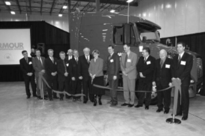 WORTH CELEBRATING: Armour Transportation Systems' president and CEO Wes Armour looks on as the ribbon is cut at the company's new $15-million multi-purpose terminal, located near the Port of Halifax.