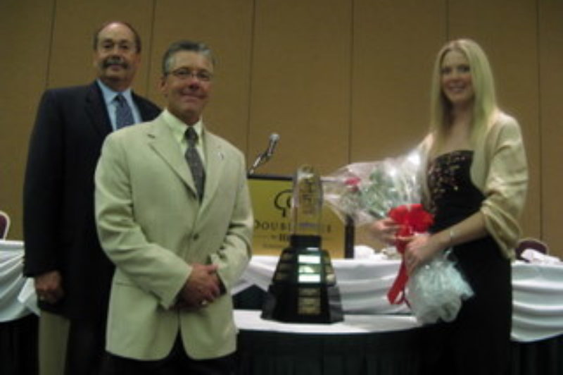 Lisa Vandespyker (right) accepted the Canadian Fleet Maintenance Manager of Year Award on behalf of her father, Ben, at a ceremony in Toronto yesterday. Also pictured are Robert Mushlian (left), vice-president of Active Transport, and Don Coldwell (centre) of Volvo Trucks Canada.